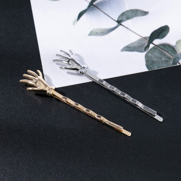 Wholesale Glossy Little Hand Skull Alloy Hair Clips