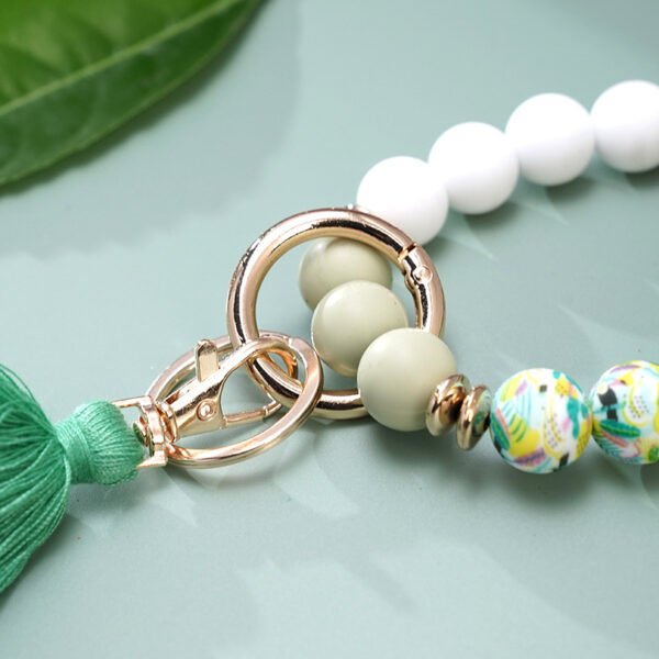 O1CN01cbLFm61b72CDCzLYE_2208367413417-0-cib Wholesale Colorful Silicone Beads Three Layers Tassel Beaded Wrist Keychain