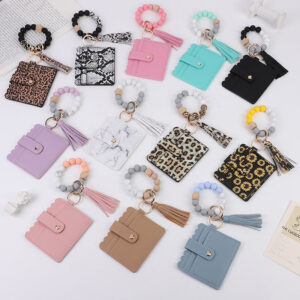 O1CN01cixs051N8UnZINYZD__2508931525-0-cib Wholesale Leopard Silicone Beaded Leather Tassel Card Bag Wrist Keychain