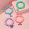 O1CN01czsHfr1Gvm4LIKelB_2208052480685-0-cib Wholesale Dinosaur Pendant Acrylic Beads Bracelet Set of 4