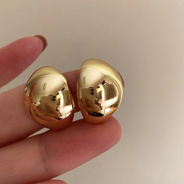 O1CN01d3G47q28NPcozzX2B__2259887920-0-cib Wholesale Irregular C-type Gild Earrings