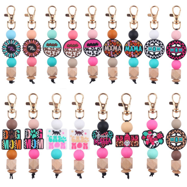 O1CN01d6ZoJb1NrNmFMN3nO_2214899881623-0-cib Wholesale Handmade Silicone Beaded Cartoon Mother's Day Keychain