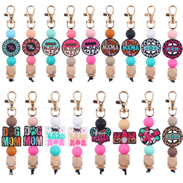 O1CN01d6ZoJb1NrNmFMN3nO__2214899881623-0-cib Wholesale Handmade Silicone Beaded Cartoon Mother's Day Keychain