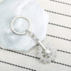 O1CN01dTbCoI2CMH8fybvGJ_1625548459-0-cib Wholesale Rotatable Diamond Snowflake Keychain