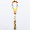 Wholesale Wooden Bead PU Printed Tassel Pendant Wrist Keychain