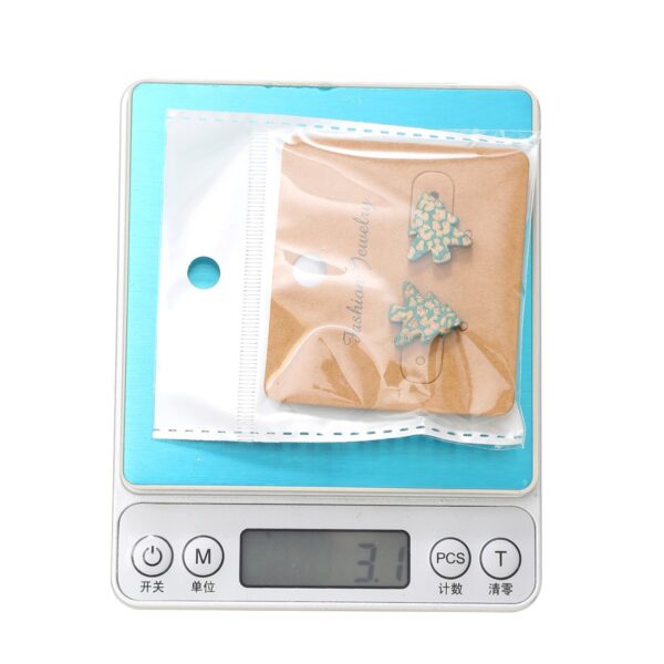 O1CN01f2LDen1ftMUqcqvIX_3172764064-0-cib Wholesale Christmas Carved Leopard Pattern Christmas Tree Wooden Earrings