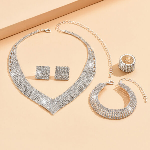 O1CN01fZB7Q21ynqPKRWim8_1988846624-0-cib Wholesale Rhinestone Silver Plated Necklace Bracelet Stretch Ring Set