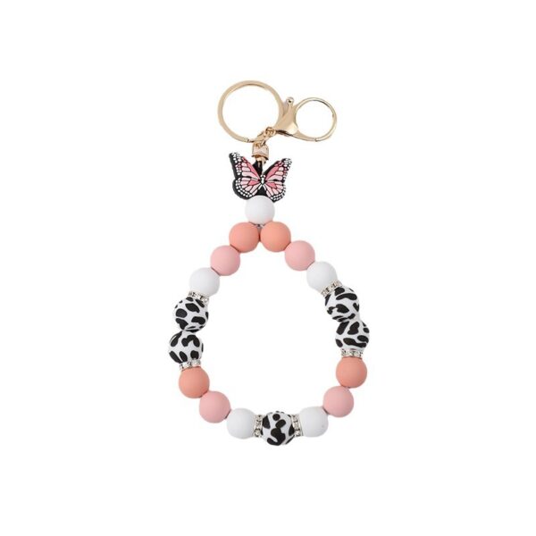 O1CN01fr9Yxc1FGjAUrrSIW_2949020460-0-cib Wholesale Rubber Tassel Silicone Wood Water Keychain