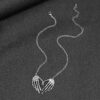 O1CN01fsZa251Xx0fSrepy8_2208407172989-0-cib Wholesale Gothic Skeleton Hand Men's Pendant Alloy Necklace