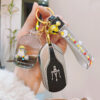 Wholesale Acrylic Quicksand Bottle Penguin Keychain