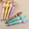 O1CN01gfzEVY1NrNlznxKqt_2214899881623-0-cib Wholesale Beaded Pens DIY Handmade Bear Silicone Beads Colorful Plastic Ballpoint Pen