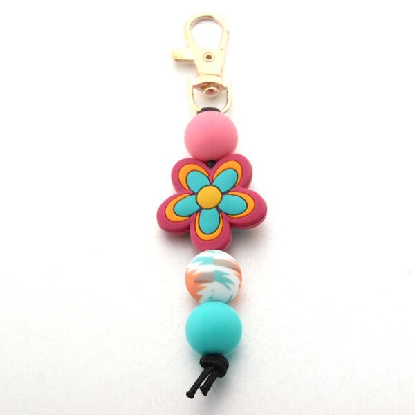 O1CN01gi1kTg1bYW5K5Qycd_2216822363477-0-cib Wholesale Cartoon Flower Coffee Silicone Beads Keychain