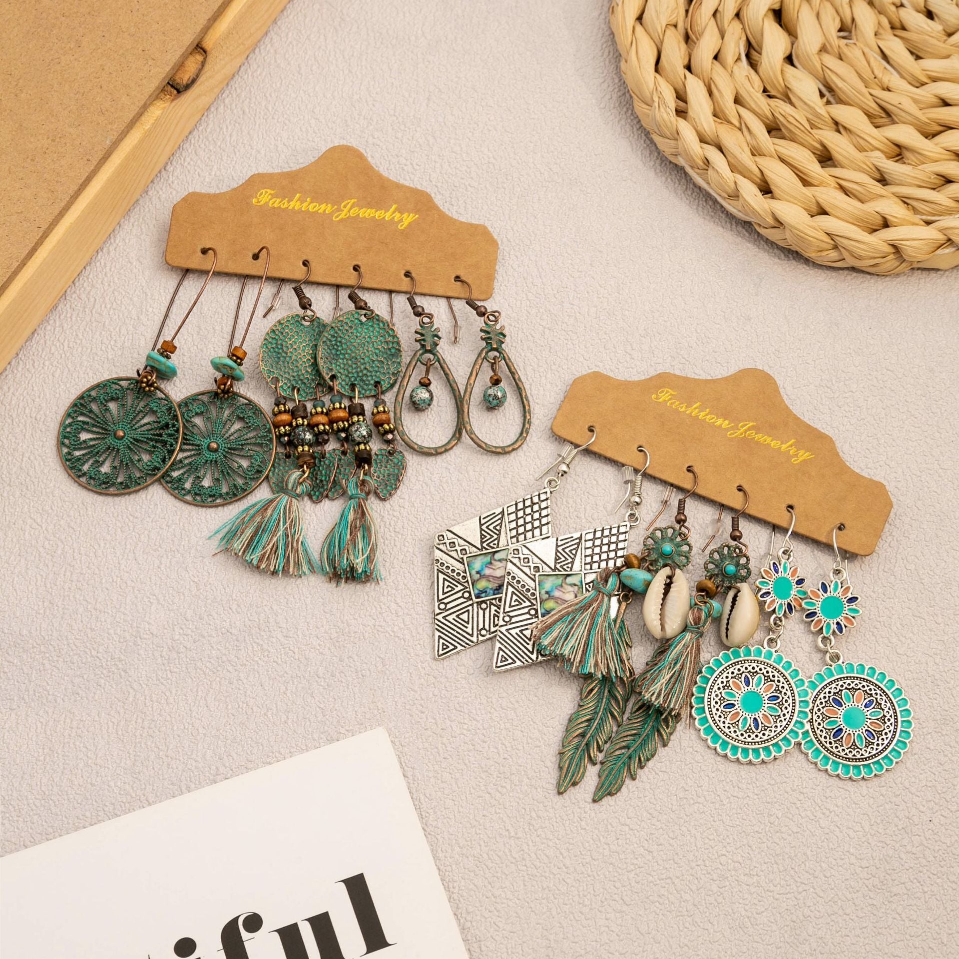 Wholesale Vintage Suower Feather Tassels Ethnic Style Round Hollow Alloy Earrings