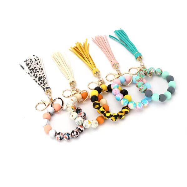 Wholesale Silicone Food Grade Cartoon Tassel Printed Silicone Wrist Keychain