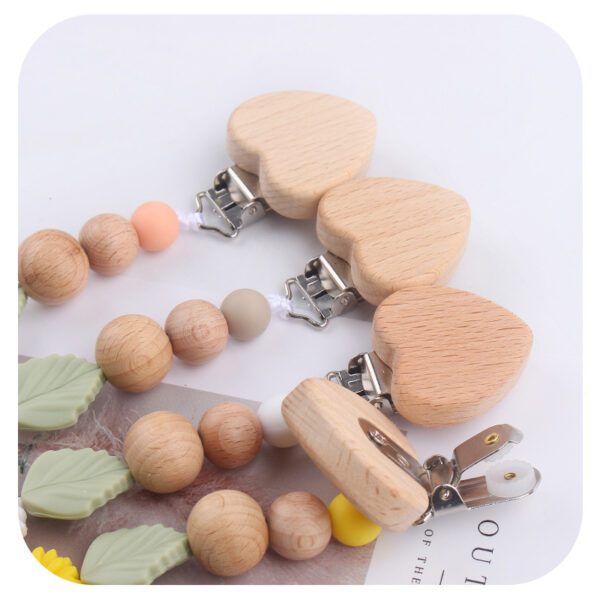 O1CN01hHcANR1uzyVZodU1y_3462466109-0-cib Wholesale Baby Cartoon Mahogany Beech Daisy Rainbow Silicone Teether