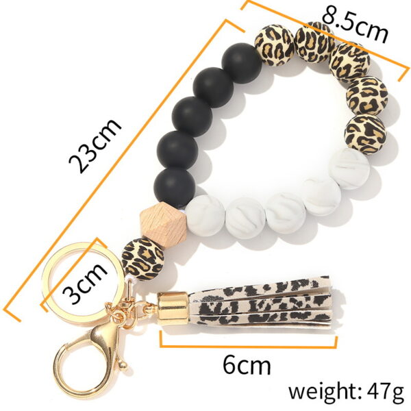 O1CN01hNZCxx1b721ygb7P2_2208367413417-0-cib-3 Wholesale Silicone Beads Tassels Bracelet Keychain