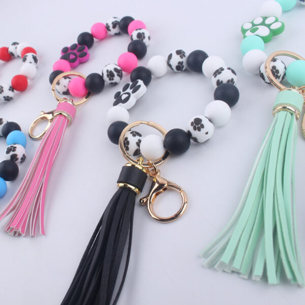 O1CN01hSHWWU1NrNk88beZJ_2214899881623-0-cib Wholesale Dog Paw Silicone Beaded Wrist Keychains