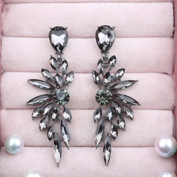Wholesale Crystal Symmetrical Wings Zinc Alloy Earrings