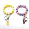 Wholesale Tassel Dragonfly Bull Head Lion Love Angel Acrylic Wrist Keychain