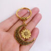O1CN01hmo1sX1nr5YT4GIzb_2212841575142-0-cib Wholesale Alloy Hollow Moon Keychain