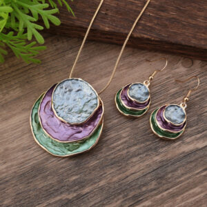 Purple green ring set-gold