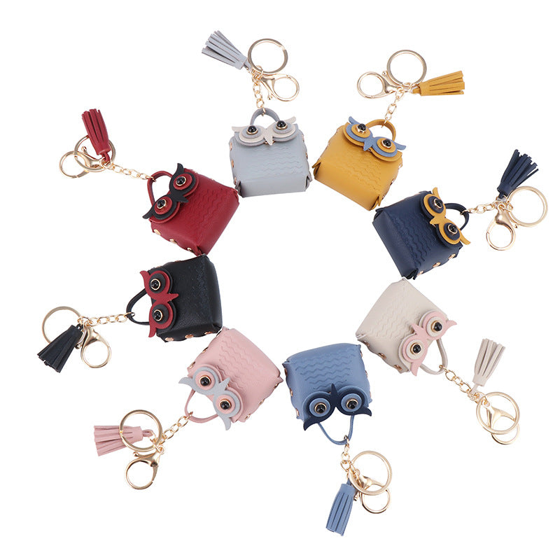 Wholesale Owl Bluetooth Headphones Artificial Leather Storage Bag Keychain