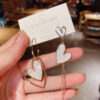 O1CN01iup8QN1yaYr9hcKmK_2215209296595-0-cib Wholesale Alloy Heart-shaped Long Earrings