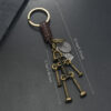 O1CN01iyF8gy1QBCDrQgS08_1866151937-0-cib Wholesale Woven Leather Rope Automotive Alloy Screw Robot Keychain