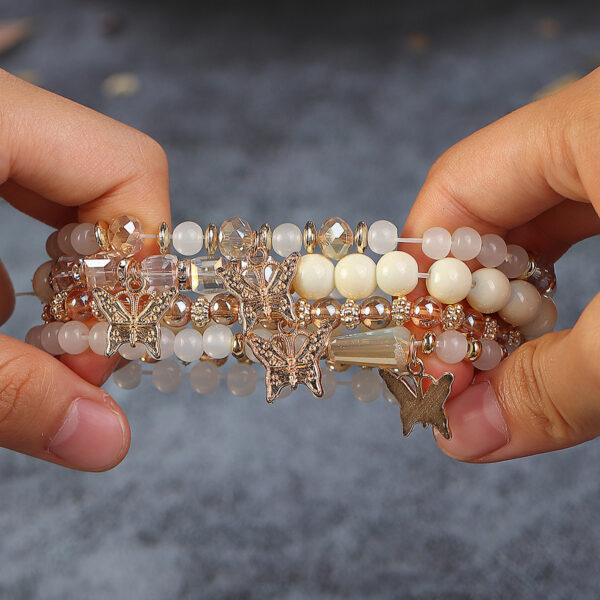 Wholesale Four Layer Butterfly Pendant Glass Elastic Bracelet