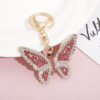 O1CN01jxTC7U1HVV1XfKH5m_2215457310763-0-cib Wholesale Zinc Alloy Full Diamond Crystal Butterfly Keychain