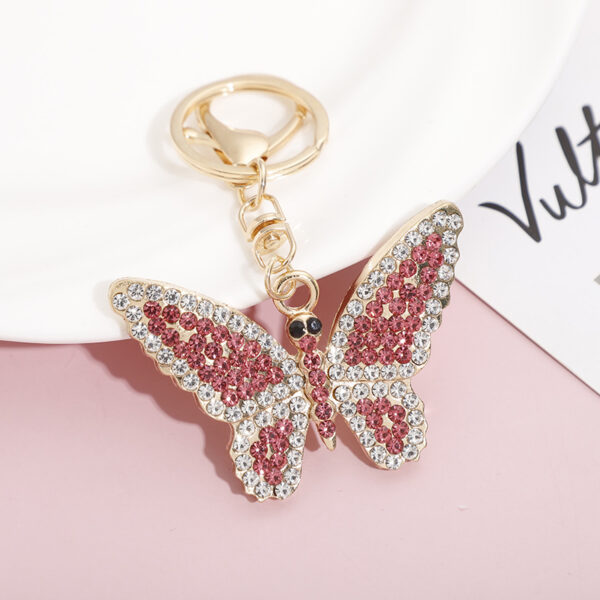 O1CN01jxTC7U1HVV1XfKH5m_2215457310763-0-cib Wholesale Zinc Alloy Full Diamond Crystal Butterfly Keychain