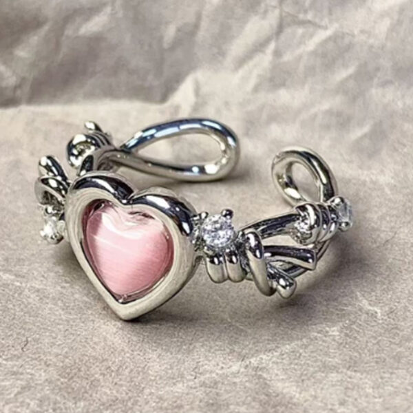 O1CN01k1VelB1Zh6LiROOKU_2681293225-0-cib Wholesale Valentine's Day Alloy Pink Love Thorn Imitation Cat Eye Zircon Ring