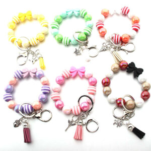 Wholesale Tassel Dragonfly Bull Head Lion Love Angel Acrylic Wrist Keychain