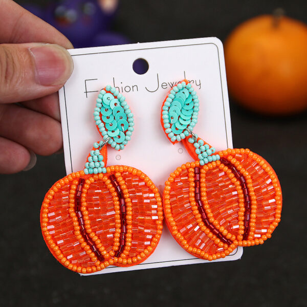 O1CN01kYD7eb1TQG0rJhU8Q_2207499512376-0-cib Wholesale Halloween Exaggerated Rice Bead Sewing Earrings