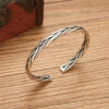 O1CN01ksoGO01lsLKU92tjg_2208865594874-0-cib Wholesale Vintage Silver Twist Braided Open Adjustable Bracelet