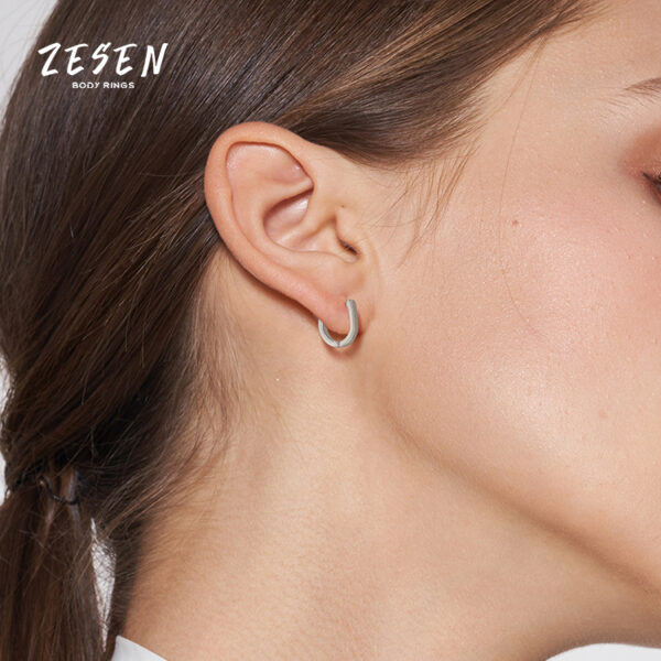 O1CN01lQkl1U1SBlbUpBGy0_2969092209-0-cib Wholesale Alien Shaped Stainless Silver Punk Earrings