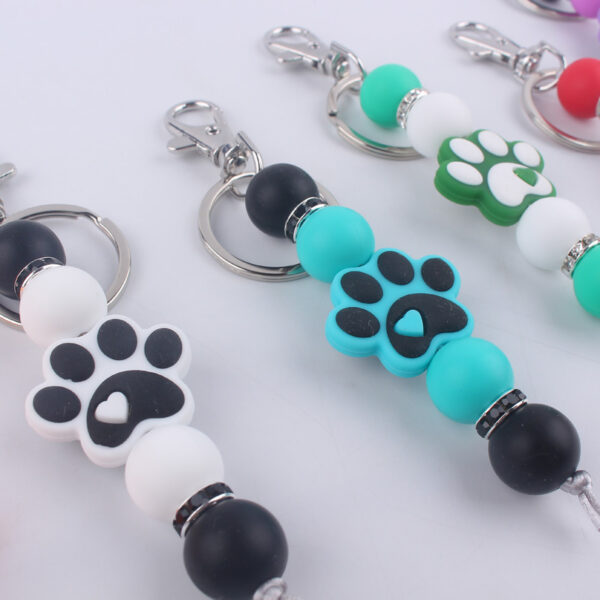 O1CN01lkLtwQ1NrNgIXn8tj_2214899881623-0-cib Wholesale Cartoon Dog Paw Silicone Handmade Beaded Keychain