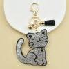 O1CN01ln5xTq1lJ4lDSz9Jg_2215653644797-0-cib Wholesale Metal Rhinestone Magic Boots Ghost Cat Cartoon Animal Keychain