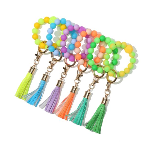 O1CN01lnW3S01eDqyzk4xbf_2216524353838-0-cib Wholesale Fluorescent Luminous Colored Silicone Beaded Wrist Keychain