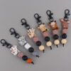 O1CN01m632PG1NrNfCwMBqN_2214899881623-0-cib Wholesale Cartoon Cow Elk Silicone Handmade Beaded Keychain
