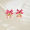 O1CN01mUEZzo1TX7xVbjTDI_2208880022391-0-cib Wholesale Simple Bow Inlaid Pearl Earrings