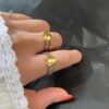 O1CN01msQiMr27MD1UPrfpA_2212438737782-0-cib Wholesale Gold and Silver Color Matching Love Chain Opening Adjustable Copper Ring