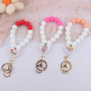 O1CN01n54nj51NrNiFWDpws__2214899881623-0-cib Wholesale Cartoon Love Printed Silicone Beaded Wrist Keychain