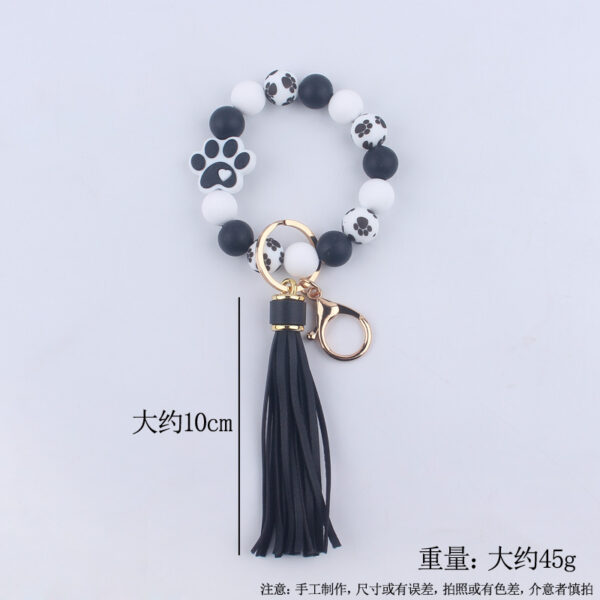 O1CN01n9sm0t1NrNk8qmgRZ_2214899881623-0-cib Wholesale Dog Paw Silicone Beaded Wrist Keychains