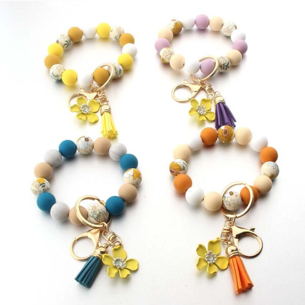 Wholesale Silicone Leather Tassel Sunflower Keychain