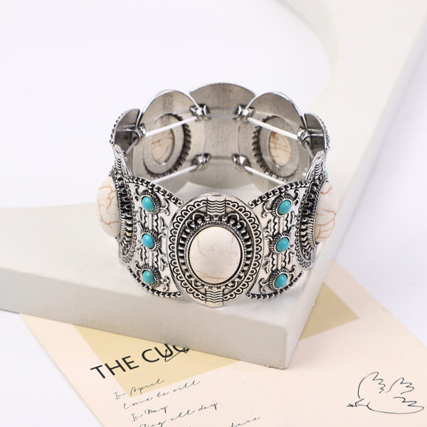 O1CN01nHdMhT1jhgnghoxEj_2215436944580-0-cib Wholesale Hollow Inlaid Turquoise Alloy Bracelet