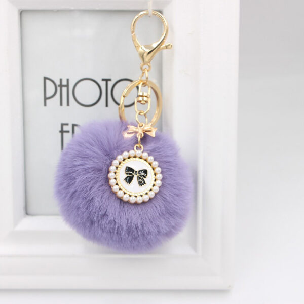 O1CN01nRFm3A1X3abJ3vi3T_2038122868-0-cib Wholesale New Bow Tag Imitation Rex Rabbit Fur Plush Ball Keychain