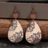 O1CN01oGjuHU1qyMbCeav1G_2206372095564-0-cib-1 Wholesale Western Style Sunflower Vintage Wood Chip Carved Water Drop Earrings