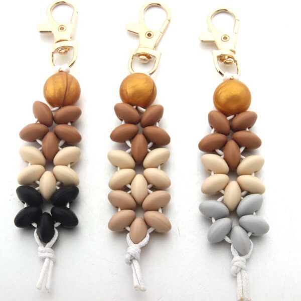 O1CN01oRBbdD1bYW5KRI1Jf_2216822363477-0-cib Wholesale Floral Silicone Bead Keychain