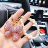 O1CN01oaVK3c2GKDxTF60IQ_2208315888996-0-cib Wholesale Full Diamond Bow Car Creative Pearl Bracelet Keychains